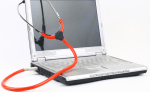 a laptop with a stethoscope attached to it